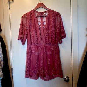 Pink short romper. Size large. Brand: Wild Honey